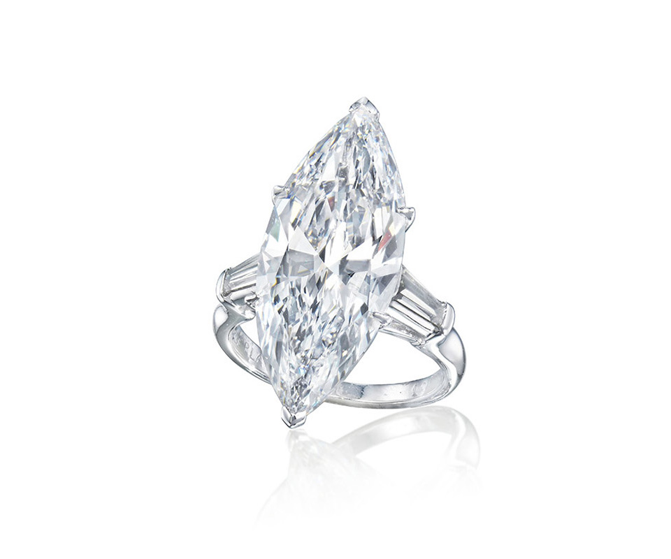 Ten carat marquise-cut diamond secured in six prong setting.