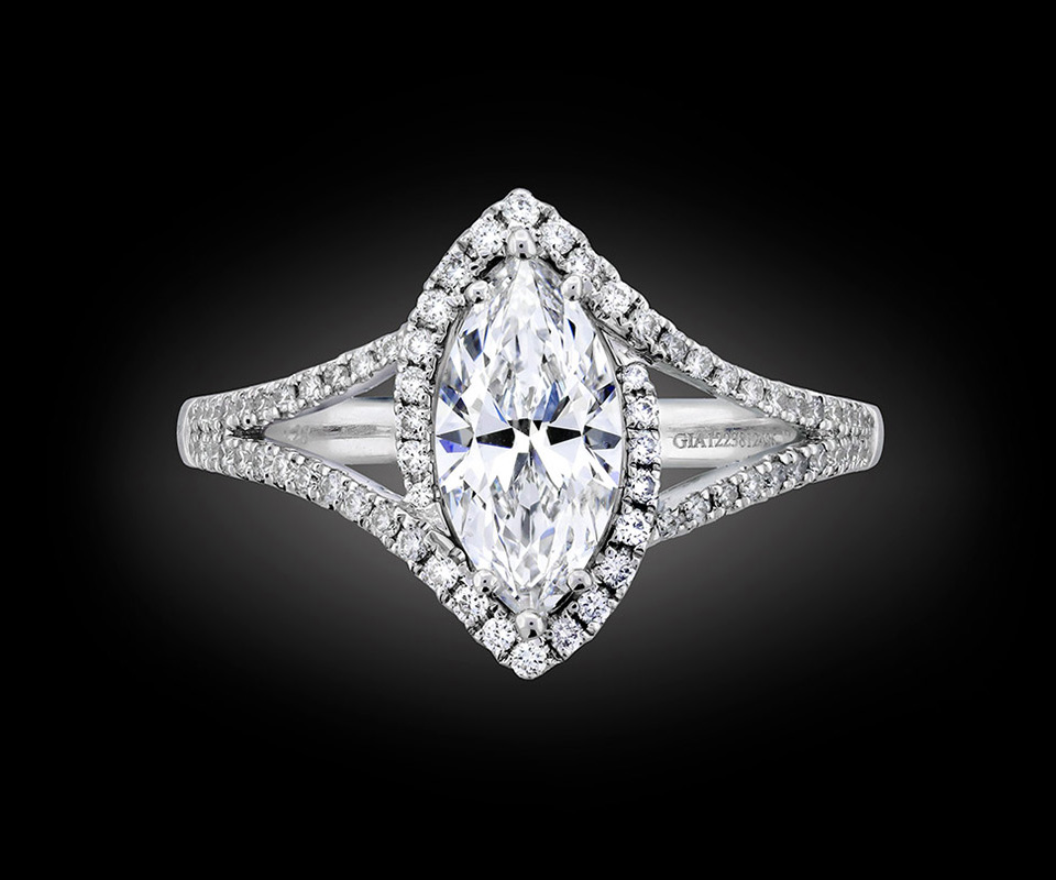 Marquise-cut diamond ring with halo and split-shank setting